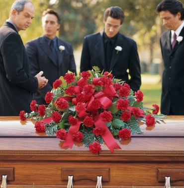 Red Regards Casket Spray.