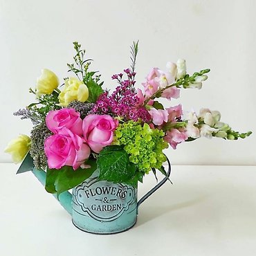Spring watering can